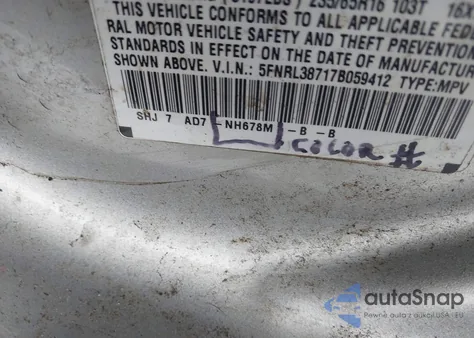 2007 Honda Odyssey Ex-L z USA, uszkodzony, nr VIN 5FNRL38717B059412